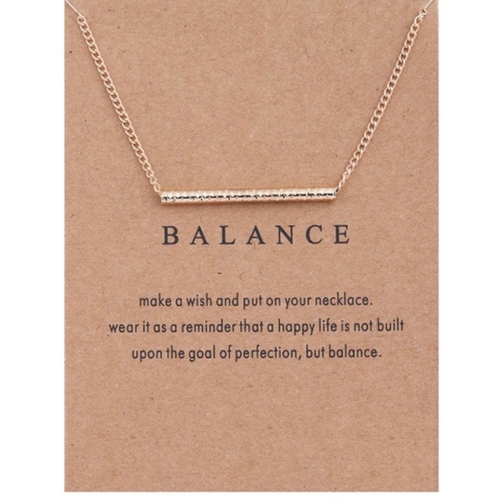 NWOT. Balance Gold Tone necklace
